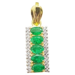 Emerald with Diamond Pendant Set in 18 Karat Gold Setting