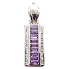 Ciondolo con zaffiro viola e diamante incastonati in oro bianco 18 carati