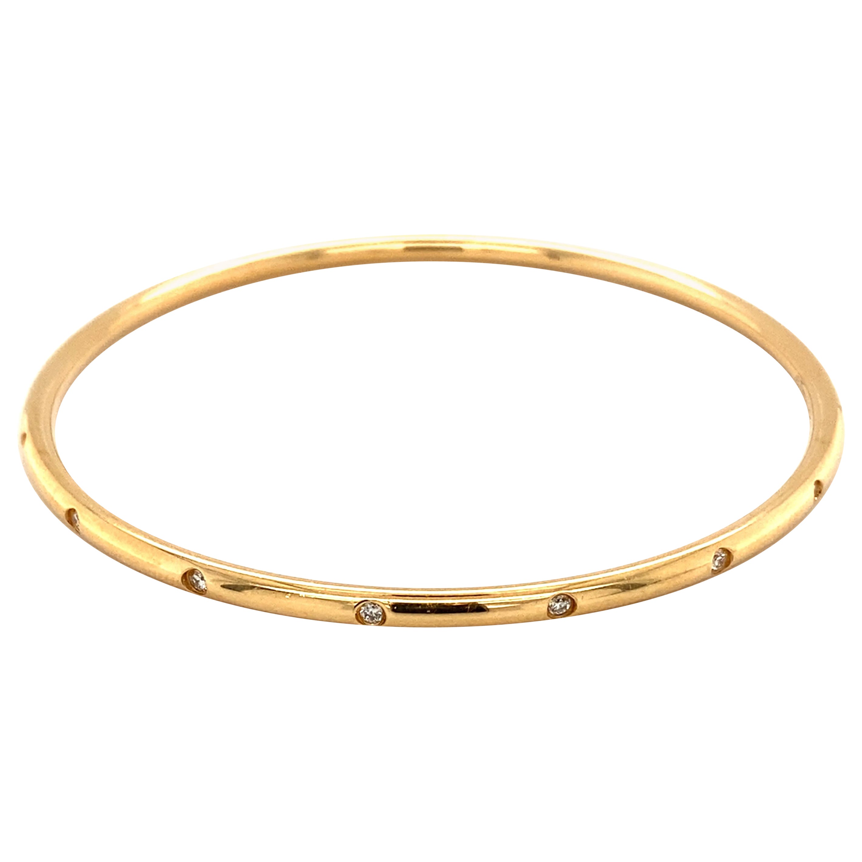 Bracelet jonc Tiffany & Co en or jaune 18 carats avec diamants 0,16 carat, années 1990 en vente