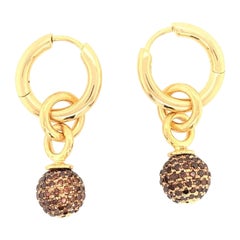 Boucles d'oreilles pendantes en or 18k avec boules de diamants