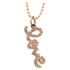 Sydney Evan, petit collier pendentif LOVE en or jaune 14 carats avec diamants