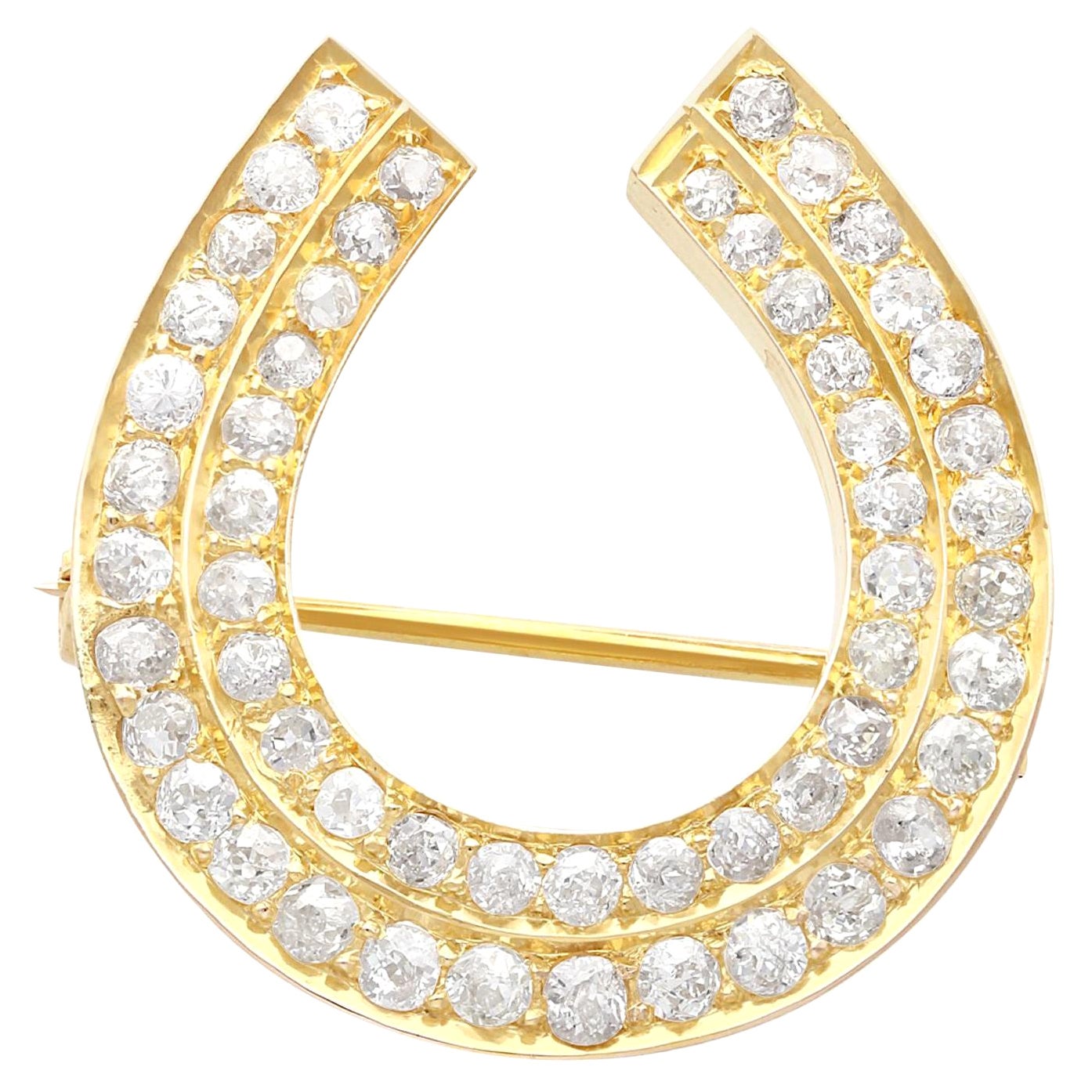 Antique 2.36 Carat Diamond and Yellow Gold Horseshoe Brooch For Sale