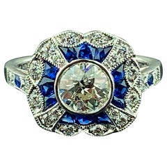 Anello in platino con diamante vecchio taglio europeo e zaffiro blu 0,75