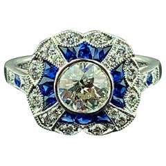 Bague en platine avec diamant taille vieille Europe de 0,75 carat et saphir bleu