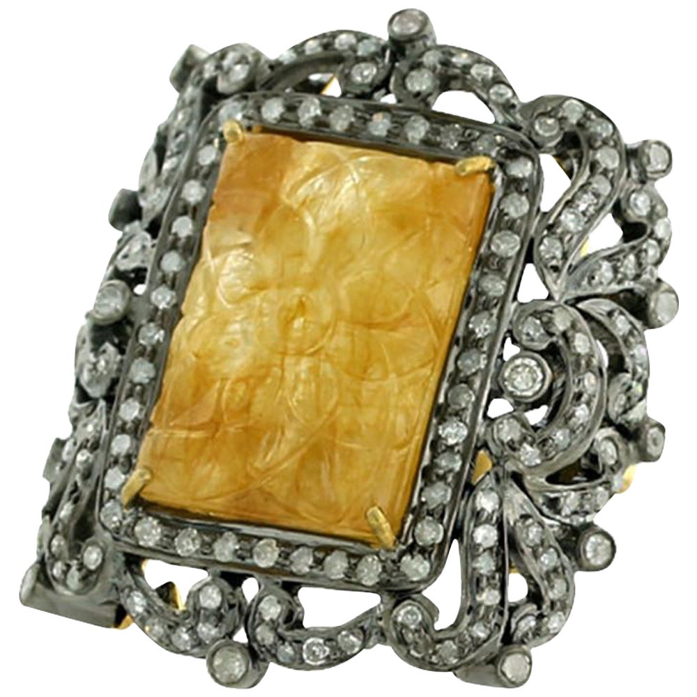 Cocktail Ring with Carved Yellow Sapphire Surrounded by Pave Diamonds