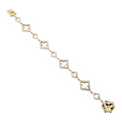 Bracciale a croce in oro giallo con diamanti Loree Rodkin