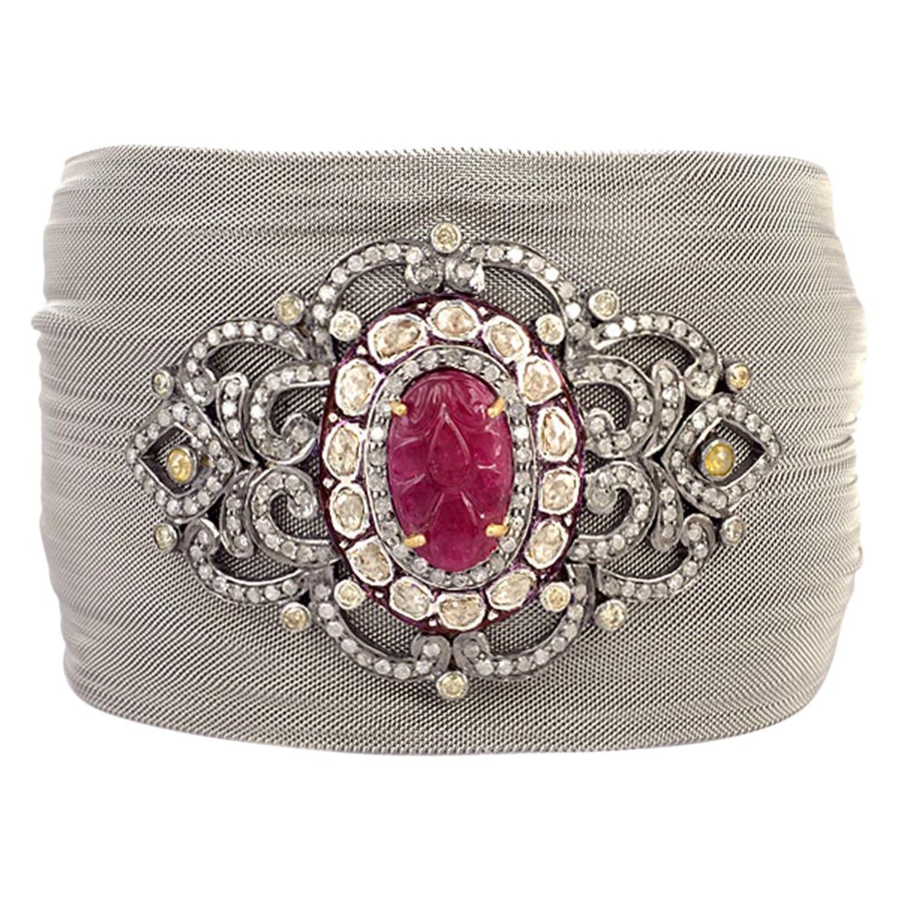 Designer Cuff With Center Stone Carved Ruby Motif & Pave Diamonds in Steel Mesh For Sale