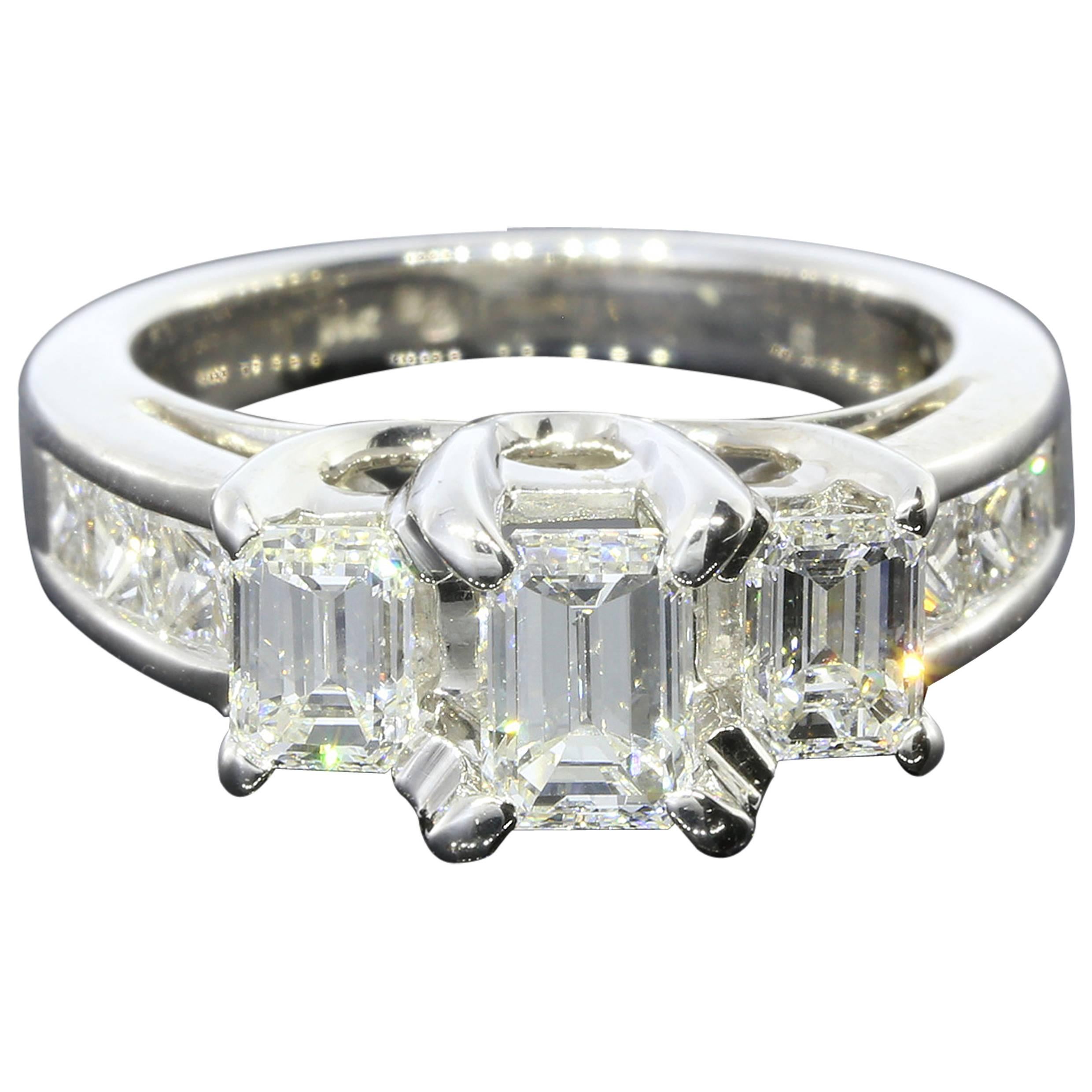 Three-Stone Emerald Cut Diamond Gold Engagement Ring For Sale