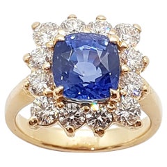 Bague en or rose 18 carats avec saphir bleu non chauffé certifié de 4 carats et diamants