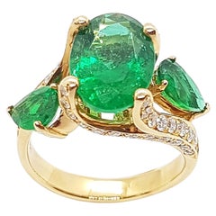 Emerald with Diamond Ring set in 18 Karat Rose Gold Settings