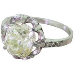 Art Deco 3.28 Carat Light Greenish Yellow Old Mine Cut Diamond Engagement Ring