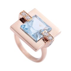 Modern 18 Karat Rose Gold Blue Topaz 0.27 Carat Diamonds Cocktail Design Ring