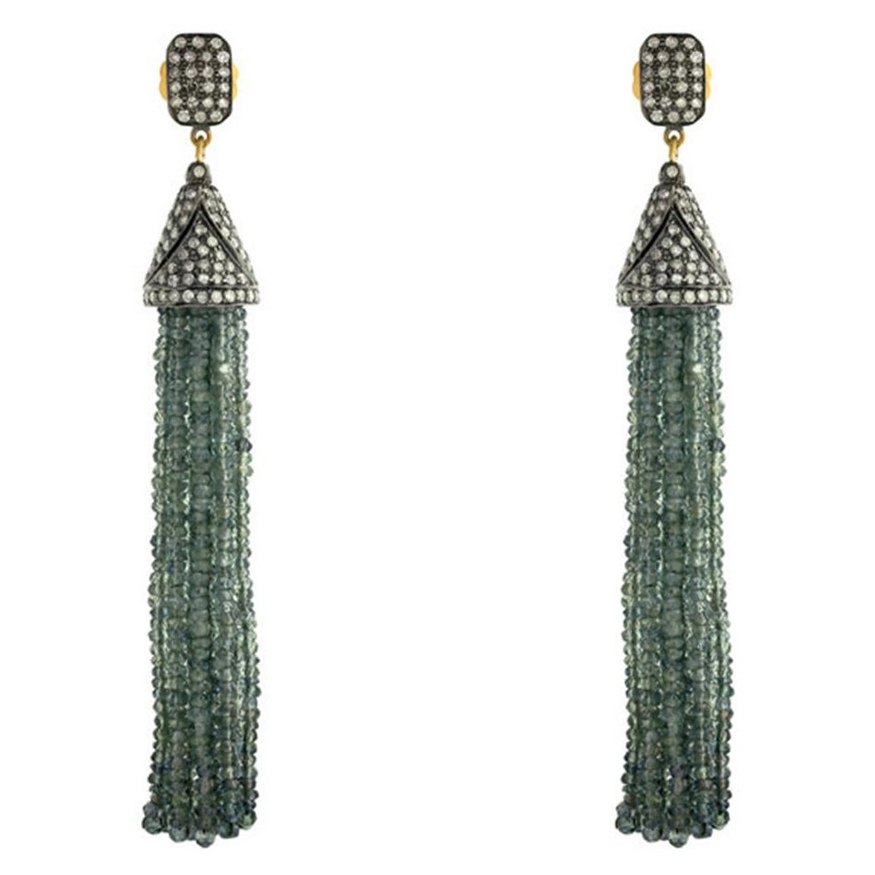 Boucles d'oreilles à pompon de créateur en or et argent avec saphirs et diamants