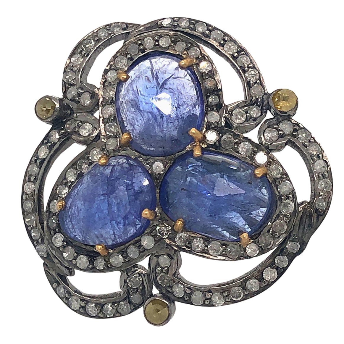 Designer-Ring aus 18 Karat Gold und Silber mit geschliffenem Tansanit und Diamant