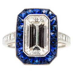 Gorgeous GIA Certified 2.26 Carat Emerald Cut Diamond Platinum Sapphire Ring