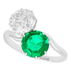 Antique 1.70 Carat Colombian Emerald and 2.18 Carat Diamond Platinum Twist Ring