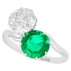 Antique 1.70 Carat Colombian Emerald and 2.18 Carat Diamond Platinum Twist Ring
