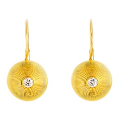Boucles d'oreilles artisanales en or 24 carats avec demi-cerceau et diamants