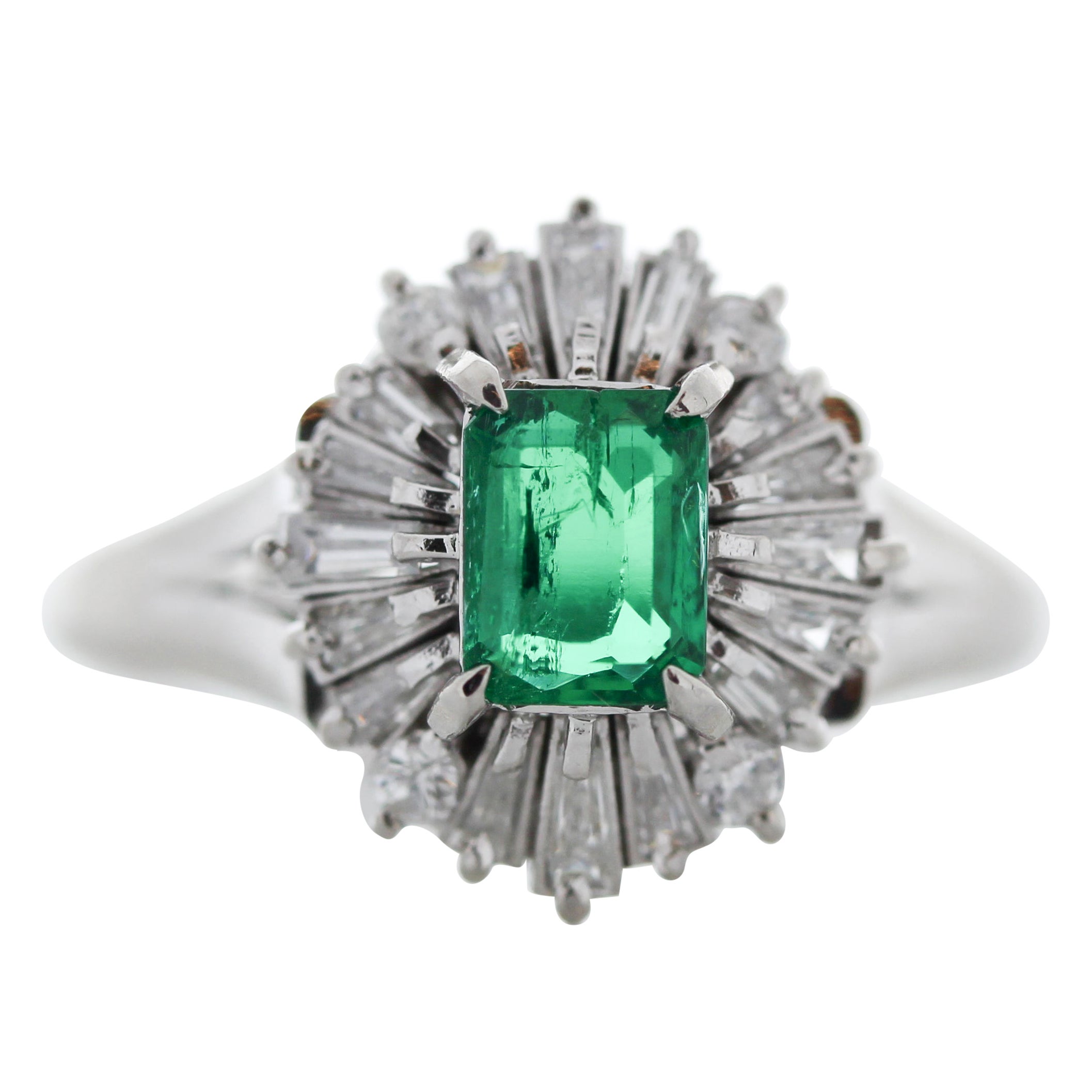 0.67 Carat Emerald Cut Emerald & Diamond Cocktail Ring in Platinum For Sale