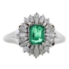 0.67 Carat Emerald Cut Emerald & Diamond Cocktail Ring in Platinum