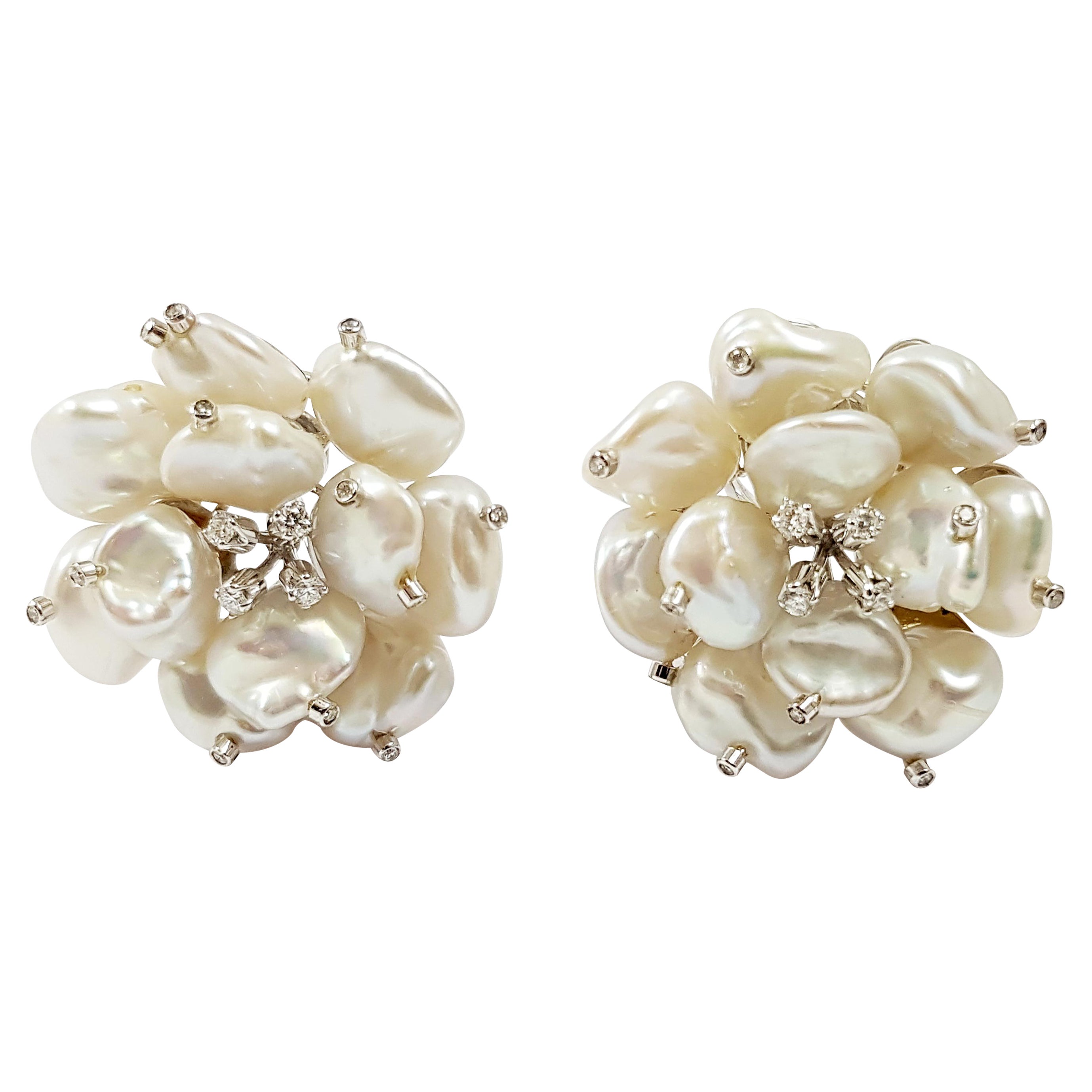 Pearl with Diamond Flower Earrings Set in 18 Karat White Gold Settings For Sale