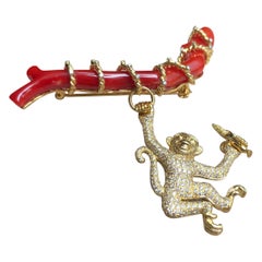 Used Coral with Yellow Diamond and Brown Diamond Monkey Brooch Set in 18 Karat Gold