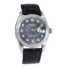 Rolex Montre en acier inoxydable avec cadran et lunette en nacre et diamants, c. 1970