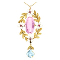 Antique 8.84 Carat Pink Topaz Aquamarine Ruby and Enamel Yellow Gold Pendant