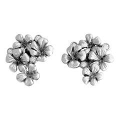 White Gold Earrings by the Artist with Diamonds Featured in Berlinale