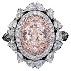 Anillo de cóctel con halo de diamante rosa natural ovalado de 2,22 quilates certificado por el GIA