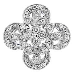 Anillo italiano de diamantes con motivo floral de oro de 18 quilates