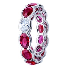 6.92 Carat Oval Ruby and Diamond East West Eternity Band Ring