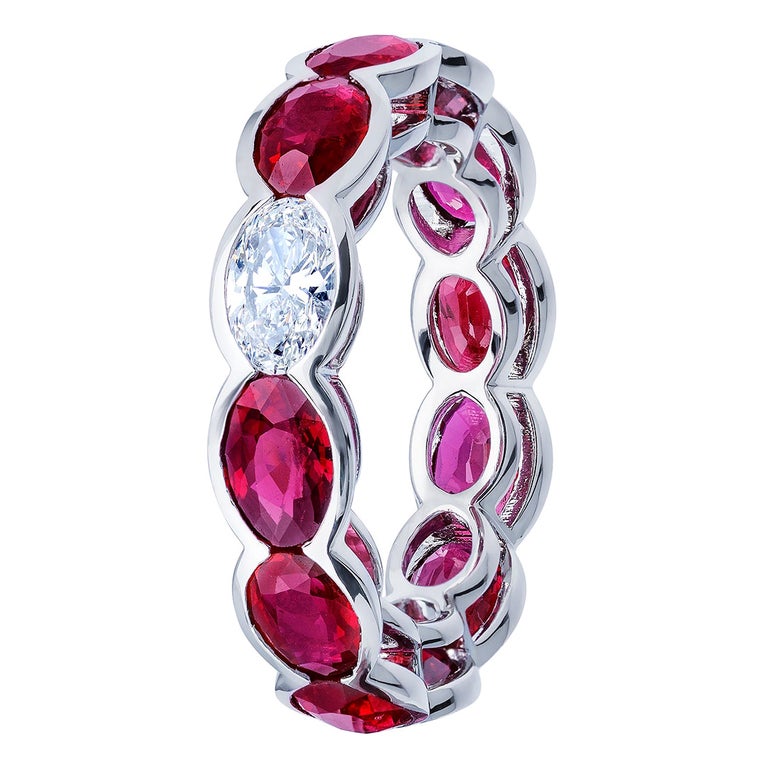 6.92 Carat Oval Ruby and Diamond East West Eternity Band Ring For Sale