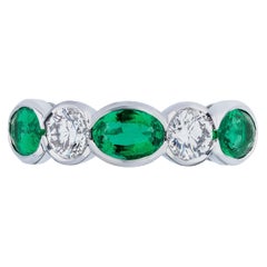 Oval Emerald and Round Diamond Five Stone Platinum Ring