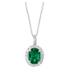 Auction - GIA Certified 3.53 Carat Oval Emerald and Diamond Pendant