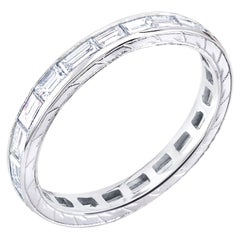 Two Platinum Eternity Bands One Baguette Diamond and One Sapphire and Diamonds