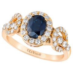 LeVian Bague cocktail classique en or jaune 14 carats avec saphir bleu et halo de diamants ronds