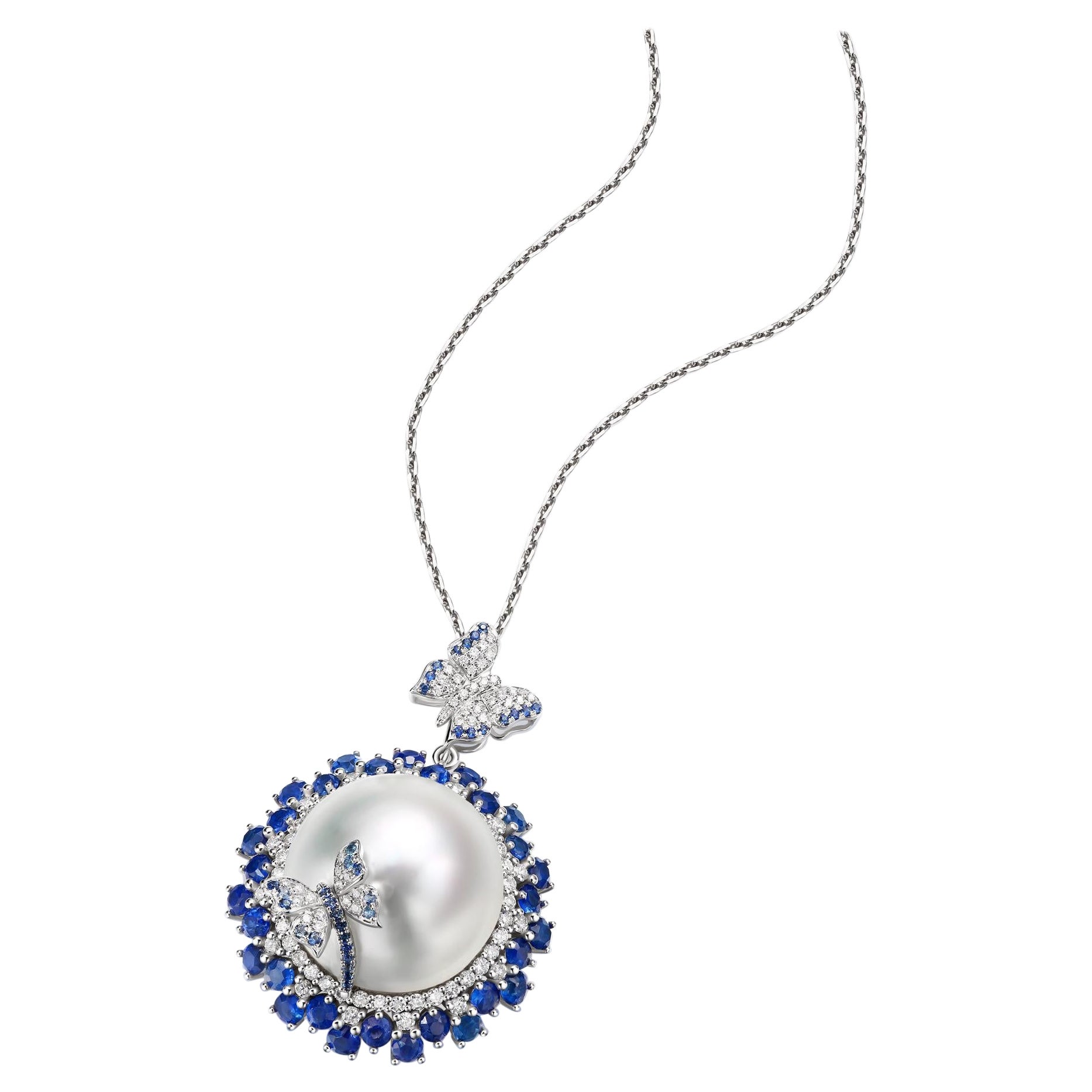 Pendentif en or blanc 18 carats avec perles des mers du Sud, saphirs bleus et diamants