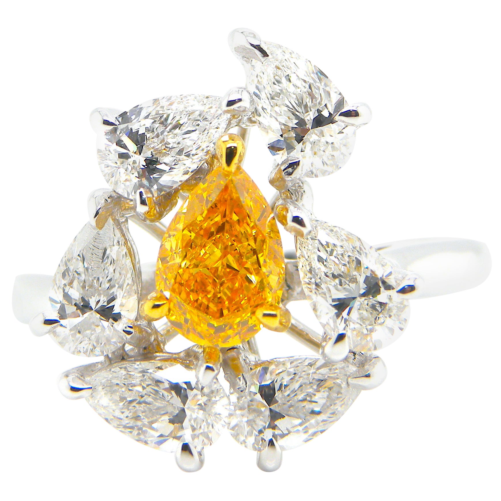 0.67 Carat GIA Certified Fancy Vivid Yellow-Orange Diamond and Diamond Ring