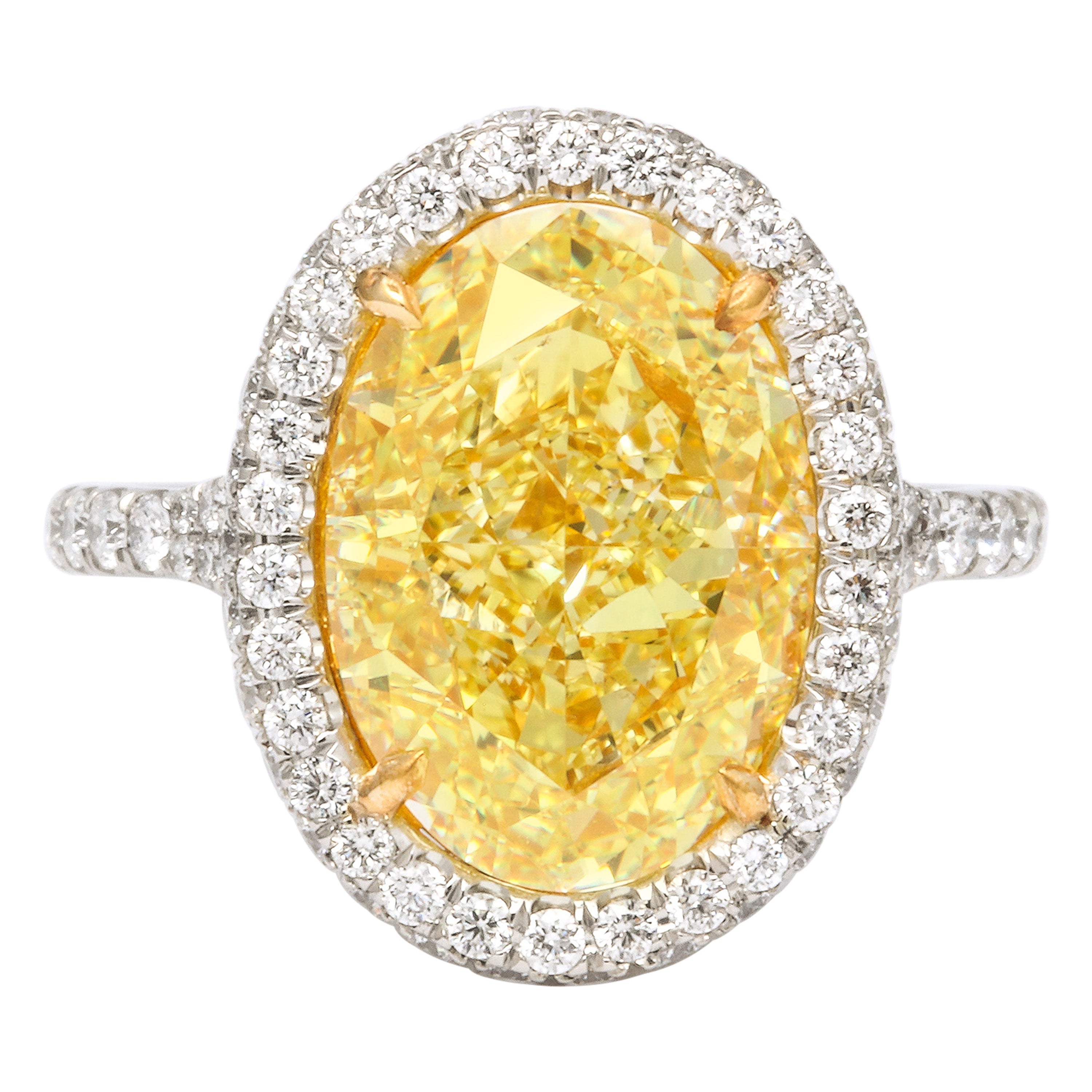 GIA Certified 5 Carat Oval Fancy Yellow Diamond Ring For Sale