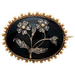 19th Century 18 Karat and Diamond and Onyx Forget Me Not Memorial Brooch