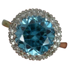 Edwardian 18ct Gold and Platinum 4ct Blue Zircon and Diamond Cluster Ring
