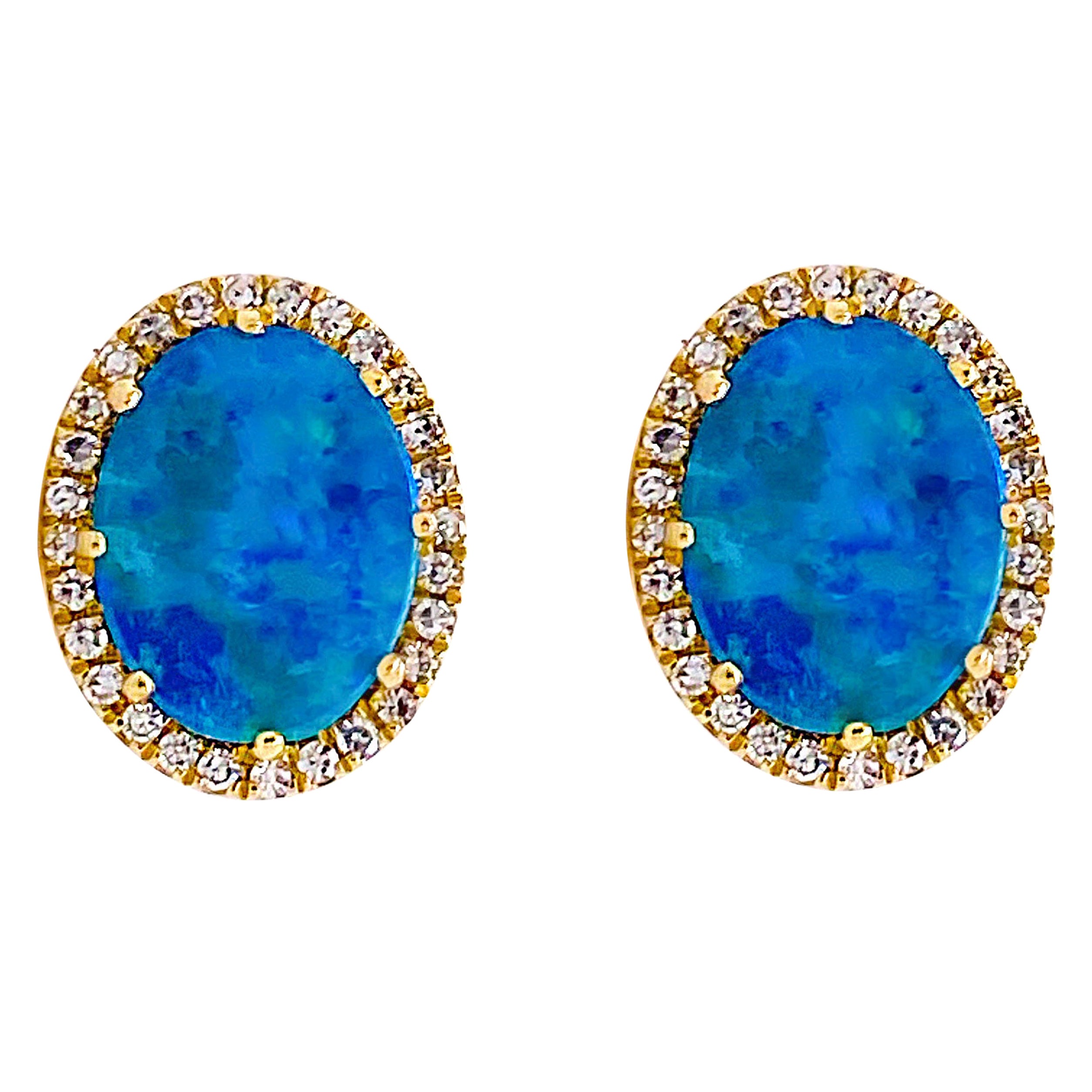 Clous d'oreilles ovales 14 carats en opale et diamants, véritable opale noire et halo de diamants en vente