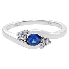 Blue Sapphire and Diamonds Twist Tension Engagement Ring in 18K White Gold