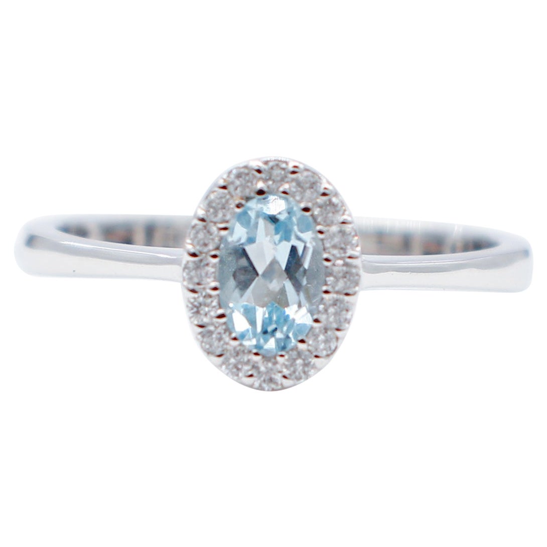 Oval Aquamarine, White Diamonds, 18 Karat White Gold Modern Ring For Sale