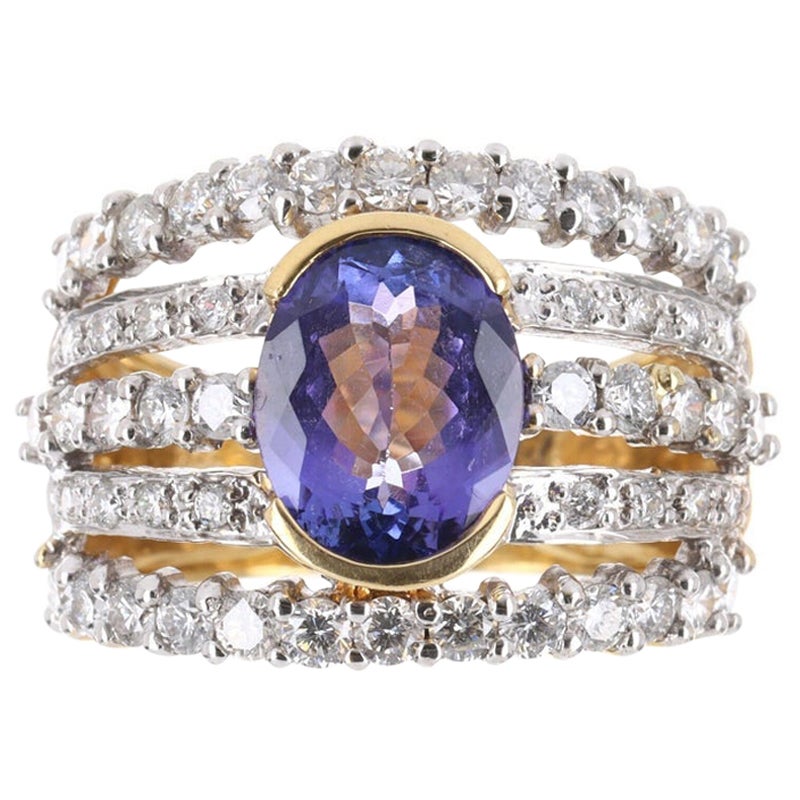 4.24tcw 18K Oval Tanzanite & Diamond Cocktail Ring For Sale