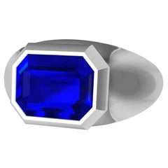 18 Karat White Gold Unisex Sculpture Ring 2.54 Carat Emerald Cut Blue Sapphire