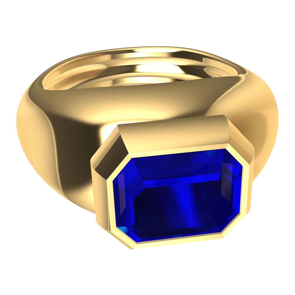 18 Karat Yellow Gold Sculpture Ring with 2.54 Carat Emerald Cut Blue Sapphire