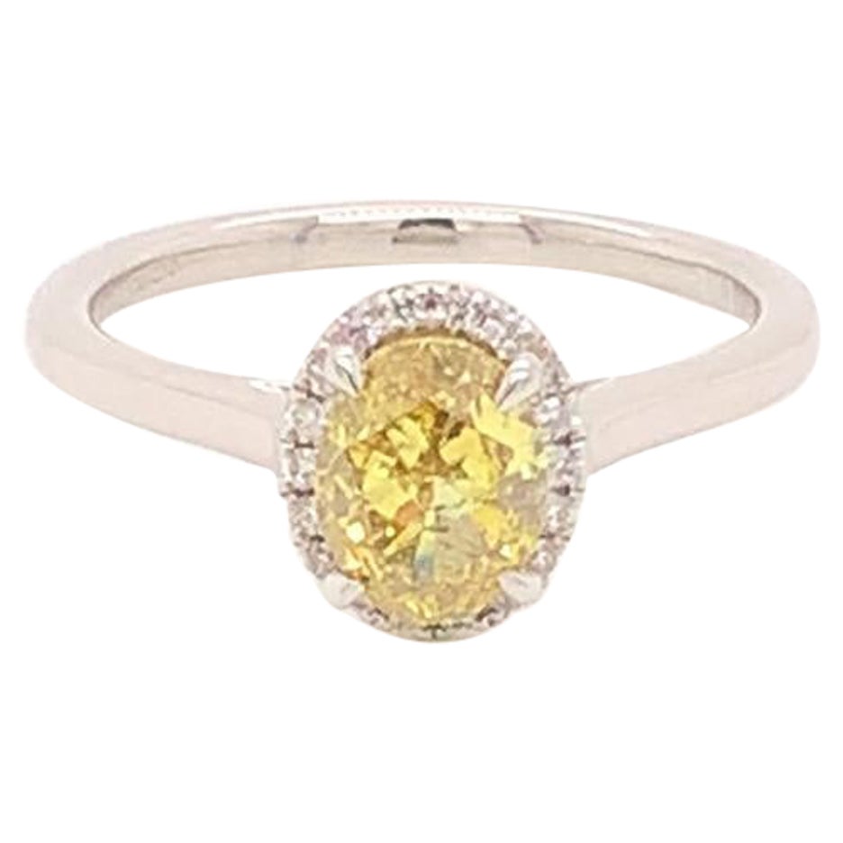 GIA Certified 1.01 Carat Oval Cut Yellow Diamond Ring in Platinum