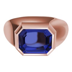 18 Karat Rose Gold Sculpture Ring with 2.54 Carat Emerald Cut Blue Sapphire